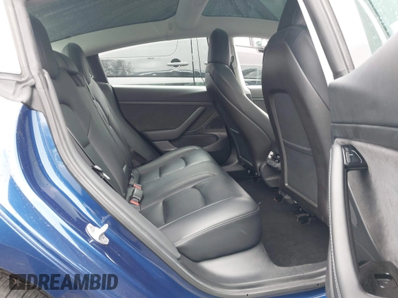 2020 Tesla Model 3 Standard Range Plus with VIN 5YJ3E1EAXLF644679, listed as a IAAI auction lot 41500595 with 53,726 mi miles and . Bid and sale history available at DreamBid. Image 8.