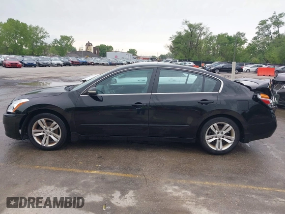 2012 Nissan Altima SR z VIN 1N4BL2AP9CC193846, wystawiony jako IAAI lot #42126067 z przebiegiem 137 470 mil mil oraz . Historia ofert i sprzedaży dostępna na DreamBid. Obrazek 15.