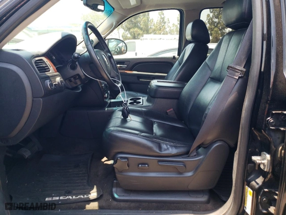 2014 Chevrolet Suburban LT with VIN 1GNSKJE74ER200677, listed as a Copart auction lot 62510114 with 249,578 mi miles and Salvage Title. Bid and sale history available at carsss.com. Image 7.