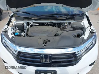 2023 Honda Odyssey Touring with VIN 5FNRL6H8XPB038875, listed as a IAAI auction lot 42441076 with 13,947 mi miles and . Bid and sale history available at DreamBid. Image 10.