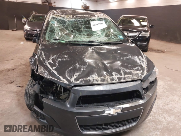 2015 Chevrolet Sonic LT z VIN 1G1JC5SH2F4197954, wystawiony jako IAAI lot #42365998 z przebiegiem 112 381 mil mil oraz . Historia ofert i sprzedaży dostępna na DreamBid. Obrazek 6.