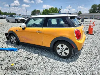 2015 MINI Hardtop z VIN WMWXM5C50F3A57281, wystawiony jako Copart lot #64920085 z przebiegiem 125 537 mil mil oraz Szkoda całkowita • Salvage title. Historia ofert i sprzedaży dostępna na DreamBid. Obrazek 2.