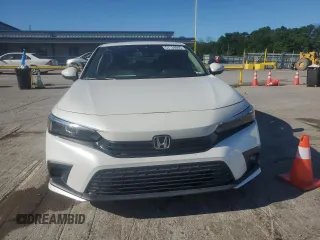 2022 Honda Civic Touring z VIN 2HGFE1F99NH301331, wystawiony jako Copart lot #57138065 z przebiegiem 77 788 mil mil oraz Szkoda całkowita • Salvage title. Historia ofert i sprzedaży dostępna na DreamBid. Obrazek 5.