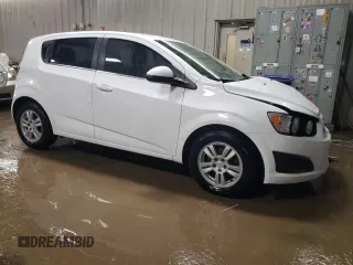 2014 Chevrolet Sonic LT with VIN 1G1JC6SH6E4239708, listed as a Copart auction lot 85530104 with 123,912 mi miles and Salvage Title. Bid and sale history available at carsss.com. Image 4.