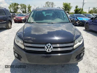 2014 Volkswagen Tiguan SE z VIN WVGAV3AX8EW613762, wystawiony jako Copart lot #61385765 z przebiegiem 167 278 mil mil oraz Czysty tytuł • Clean title. Historia ofert i sprzedaży dostępna na DreamBid. Obrazek 5.