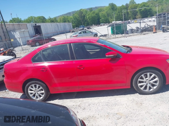 2012 Volkswagen Jetta Sedan SE w/Convenience with VIN 3VWDX7AJOCM340325, listed as a IAAI auction lot 42053766 with 171,254 mi miles. Bid and sale history available at carsss.com. Image 13.
