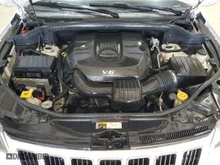 2015 Jeep Grand Cherokee Laredo with VIN 1C4RJFAG4FC886141, listed as a Copart auction lot 43654175 with 227,069 mi miles and Clean Title. Bid and sale history available at carsss.com. Image 12.