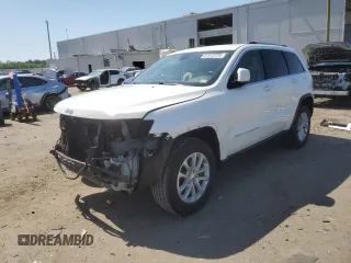 2016 Jeep Grand Cherokee Laredo with VIN 1C4RJEAG4GC500524, listed as a Copart auction lot 61613725 with 122,467 mi miles and Salvage title. Bid and sale history available at DreamBid. Image 1.