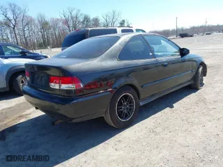 1997 Honda Civic EX with VIN 1HGEJ8245VL054080, listed as a IAAI auction lot 41880386 with 286,568 mi miles. Bid and sale history available at carsss.com. Image 4.