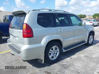 2003 Lexus GX with VIN JTJBT20X530002434, listed as a IAAI auction lot 42176772 with 140,226 mi miles. Bid and sale history available at carsss.com. Image 4.