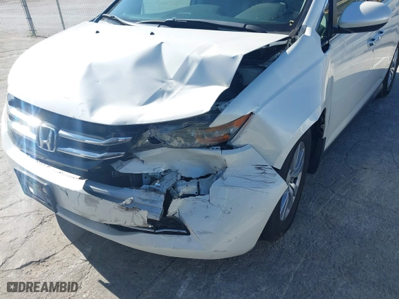 2016 Honda Odyssey EX-L with VIN 5FNRL5H65GB055916, listed as a IAAI auction lot 41980339 with 87,497 mi miles. Bid and sale history available at carsss.com. Image 6.