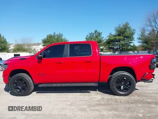 2021 Ram 1500 Big Horn with VIN 1C6SRFFT3MN677725, listed as a IAAI auction lot 41989636 with 37,784 mi miles and . Bid and sale history available at DreamBid. Image 12.