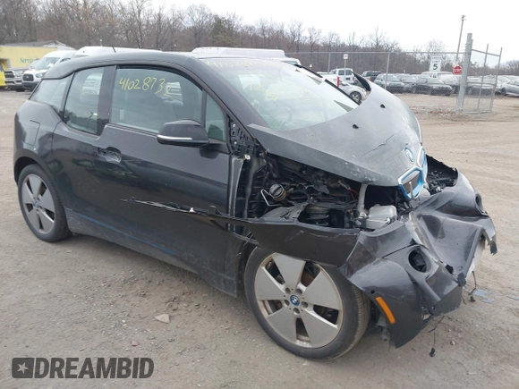2015 BMW i3 z VIN WBY1Z4C5XFV501268, wystawiony jako IAAI lot #41028732 z przebiegiem 75 283 mil mil oraz . Historia ofert i sprzedaży dostępna na DreamBid. Obrazek 1.