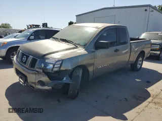 2006 Nissan Titan SE with VIN 1N6AA06A66N527552, listed as a Copart auction lot 52979735 with 218,731 mi miles and Salvage title. Bid and sale history available at DreamBid. Image 1.
