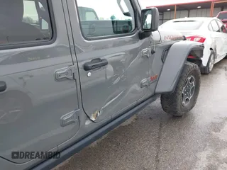 2022 Jeep Gladiator Mojave z VIN 1C6JJTEG8NL130971, wystawiony jako IAAI lot #41163074 z przebiegiem 47 142 mil mil oraz . Historia ofert i sprzedaży dostępna na DreamBid. Obrazek 20.