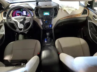2016 Hyundai Santa Fe z VIN 5XYZU3LB7GG373891, wystawiony jako Copart lot #81058604 z przebiegiem 104 871 mil mil oraz Szkoda całkowita • Salvage title. Historia ofert i sprzedaży dostępna na DreamBid. Obrazek 8.