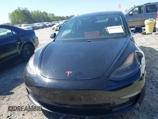 2018 Tesla Model 3 Long Range Battery z VIN 5YJ3E1EA9JF123109, wystawiony jako IAAI lot #42038158 z przebiegiem 133 361 mil mil oraz . Historia ofert i sprzedaży dostępna na DreamBid. Obrazek 12.