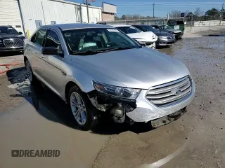 2015 Ford Taurus SE with VIN 1FAHP2D84FG149799, listed as a Copart auction lot 88993345 with 114,131 mi miles and Salvage Title. Bid and sale history available at DreamBid. Image 14.
