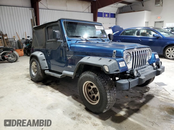 2003 Jeep Wrangler Sport with VIN 1J4FA49S23P344132, listed as a Copart auction lot 73292894 with 147,252 mi miles and Salvage Title. Bid and sale history available at carsss.com. Image 4.
