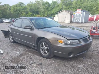 2002 Pontiac Grand Prix GT with VIN 1G2WP52K12F291338, listed as a IAAI auction lot 42757128 with 178,547 mi miles and . Bid and sale history available at DreamBid. Image 1.