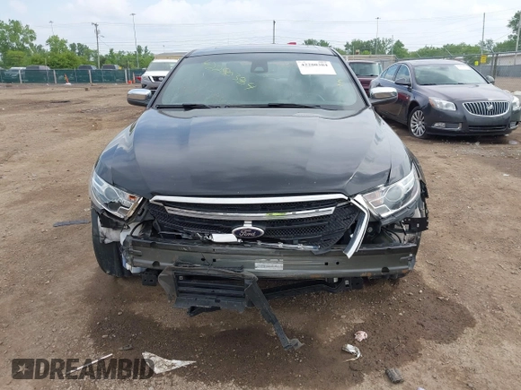 2019 Ford Taurus Limited z VIN 1FAHP2F82KG111088, wystawiony jako IAAI lot #42280384 z przebiegiem 97 961 mil mil oraz . Historia ofert i sprzedaży dostępna na DreamBid. Obrazek 13.