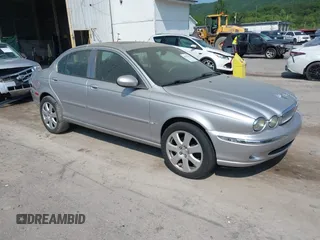 2005 Jaguar X-Type 3.0L z VIN SAJWA51AX5WE51828, wystawiony jako IAAI lot #42393333 z przebiegiem 176 000 mil mil oraz . Historia ofert i sprzedaży dostępna na DreamBid. Obrazek 1.