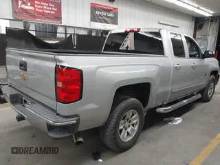 2017 Chevrolet Silverado 1500 LT with VIN 1GCRCREC2HZ335550, listed as a IAAI auction lot 41518117 with 155,694 mi miles and . Bid and sale history available at DreamBid. Image 4.