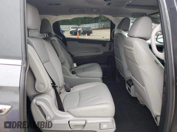 2023 Honda Odyssey Touring with VIN 5FNRL6H86PB024066, listed as a Copart auction lot 58414575 with 29,827 mi miles and Salvage title. Bid and sale history available at DreamBid. Image 11.