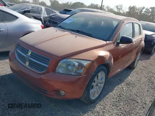 2011 Dodge Caliber Heat with VIN 1B3CB5HA1BD261958, listed as a IAAI auction lot 40570857 with 141,176 mi miles and . Bid and sale history available at DreamBid. Image 2.