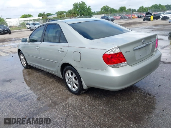 2005 Toyota Camry LE with VIN JTDBF32KX50163799, listed as a IAAI auction lot 41937898 with 140,616 mi miles and . Bid and sale history available at DreamBid. Image 3.