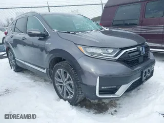 2020 Honda CR-V Hybrid Touring with VIN 7FART6H91LE001303, listed as a IAAI auction lot 41429438 with 61,560 mi miles. Bid and sale history available at carsss.com. Image 1.