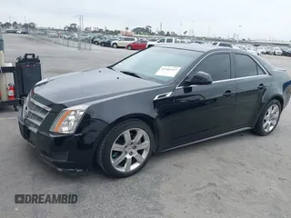 2011 Cadillac CTS Luxury with VIN 1G6DF5EYXB0103430, listed as a IAAI auction lot 42105337 with 205,069 mi miles and . Bid and sale history available at DreamBid. Image 2.