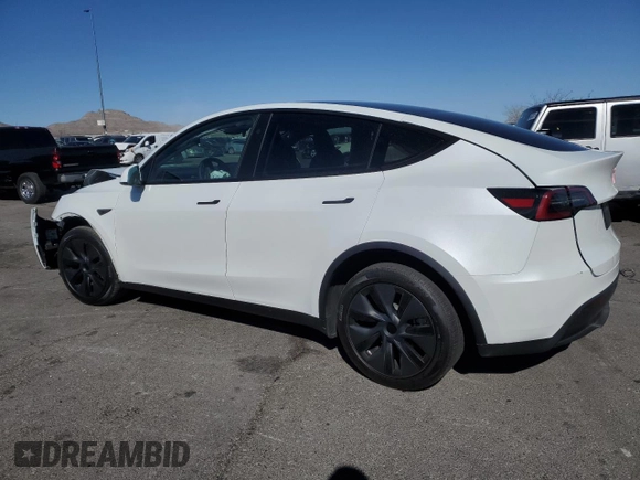 2025 Tesla Model Y Long Range with VIN 7SAYGDED2SA373756, listed as a Copart auction lot 49866835 with 3,318 mi miles and Salvage Title. Bid and sale history available at DreamBid. Image 2.