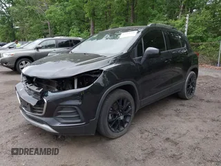 2021 Chevrolet Trax LT with VIN KL7CJLSB5MB322117, listed as a IAAI auction lot 42161568 with 63,344 mi miles and . Bid and sale history available at DreamBid. Image 2.