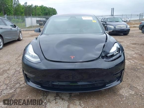 2018 Tesla Model 3 Long Range Battery z VIN 5YJ3E1EB3JF186733, wystawiony jako IAAI lot #42093891 z przebiegiem 102 435 mil mil oraz . Historia ofert i sprzedaży dostępna na DreamBid. Obrazek 12.