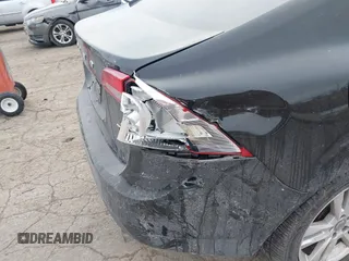 2013 Volvo S60 T5 with VIN YV1612FHXD2186540, listed as a IAAI auction lot 41428794 with 116,873 mi miles. Bid and sale history available at carsss.com. Image 6.