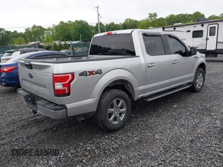 2019 Ford F-150 XL with VIN 1FTEW1EP3KFB61412, listed as a IAAI auction lot 42242393 with 117,503 mi miles and . Bid and sale history available at DreamBid. Image 4.