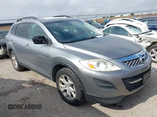 2012 Mazda CX-9 Touring z VIN JM3TB2CA0C0348092, wystawiony jako IAAI lot #42120326 z przebiegiem 123 058 mil mil oraz . Historia ofert i sprzedaży dostępna na DreamBid. Obrazek 1.