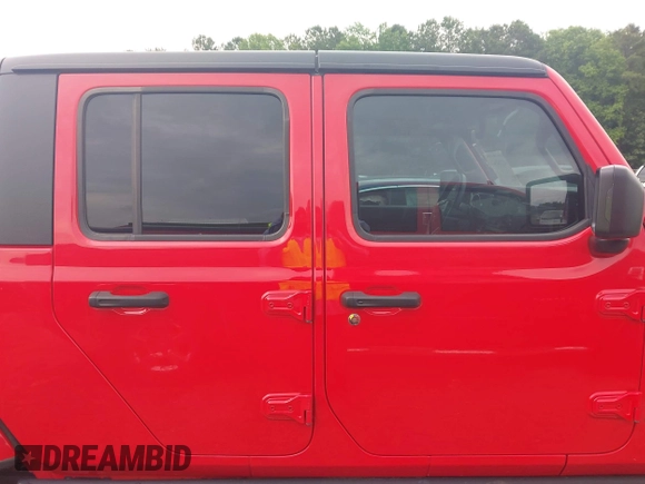 2023 Jeep Gladiator Sport S z VIN 1C6HJTAG4PL544871, wystawiony jako IAAI lot #42382428 z przebiegiem 33 453 mil mil oraz . Historia ofert i sprzedaży dostępna na DreamBid. Obrazek 13.
