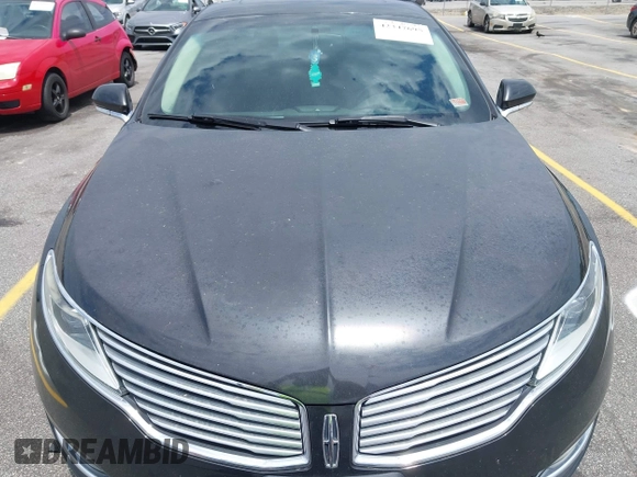 2013 Lincoln MKZ z VIN 3LN6L2GK1DR800859, wystawiony jako IAAI lot #42347695 z przebiegiem 193 300 mil mil oraz . Historia ofert i sprzedaży dostępna na DreamBid. Obrazek 10.