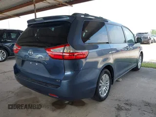 2015 Toyota Sienna XLE with VIN 5TDYK3DC7FS618571, listed as a IAAI auction lot 41930199 with 49,516 mi miles and . Bid and sale history available at carsss.com. Image 4.