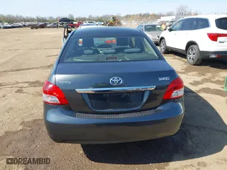 2009 Toyota Yaris with VIN JTDBT903194047784, listed as a IAAI auction lot 42049872 with 115,735 mi miles. Bid and sale history available at carsss.com. Image 16.