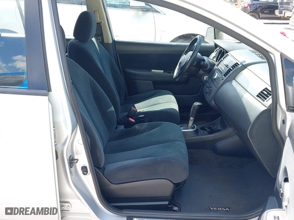 2012 Nissan Versa S with VIN 3N1BC1CP2CK278929, listed as a IAAI auction lot 42080650 with 169,609 mi miles. Bid and sale history available at carsss.com. Image 5.