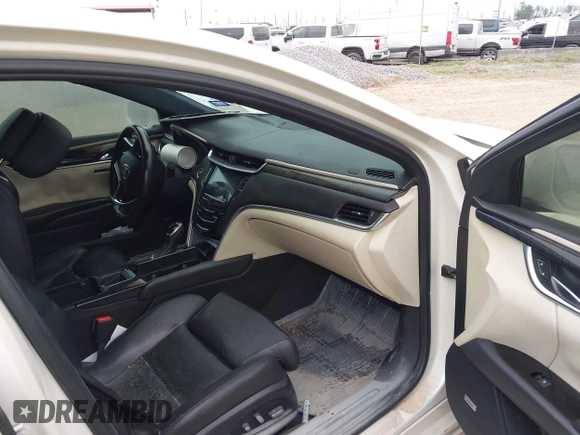 2013 Cadillac XTS Platinum z VIN 2G61U5S3XD9208737, wystawiony jako IAAI lot #41928451 z przebiegiem 167 984 mil mil oraz . Historia ofert i sprzedaży dostępna na DreamBid. Obrazek 5.