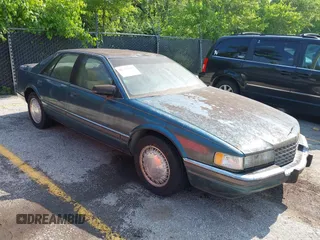 1992 Cadillac Seville z VIN 1G6KS53B4NU818363, wystawiony jako IAAI lot #42357836 z przebiegiem 91 439 mil mil oraz . Historia ofert i sprzedaży dostępna na DreamBid. Obrazek 1.