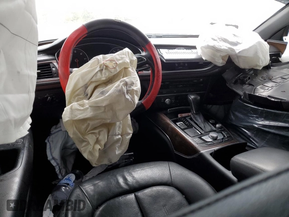 2016 Audi A7 Premium Plus z VIN WAUWGAFC4GN015401, wystawiony jako Copart lot #87072504 z przebiegiem Nie podano mil oraz Szkoda całkowita • Salvage title. Historia ofert i sprzedaży dostępna na DreamBid. Obrazek 8.