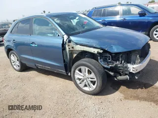 2017 Audi Q3 Premium with VIN WA1ECCFS6HR000870, listed as a IAAI auction lot 42028017 with 103,930 mi miles. Bid and sale history available at carsss.com. Image 1.