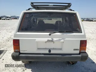 1996 Jeep Cherokee Sport with VIN 1J4FJ68S1TL128597, listed as a Copart auction lot 49600545 with 201,074 mi miles and Salvage title. Bid and sale history available at DreamBid. Image 6.