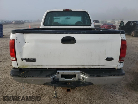 2004 Ford Super Duty F-250 XL with VIN 1FTNX20L34EB74712, listed as a Copart auction lot 72025064 with 141,857 mi miles and Salvage Title. Bid and sale history available at carsss.com. Image 6.