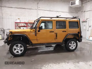 2014 Jeep Wrangler Unlimited Rubicon with VIN 1C4BJWFG7EL254534, listed as a IAAI auction lot 41279731 with 140,218 mi miles. Bid and sale history available at carsss.com. Image 14.